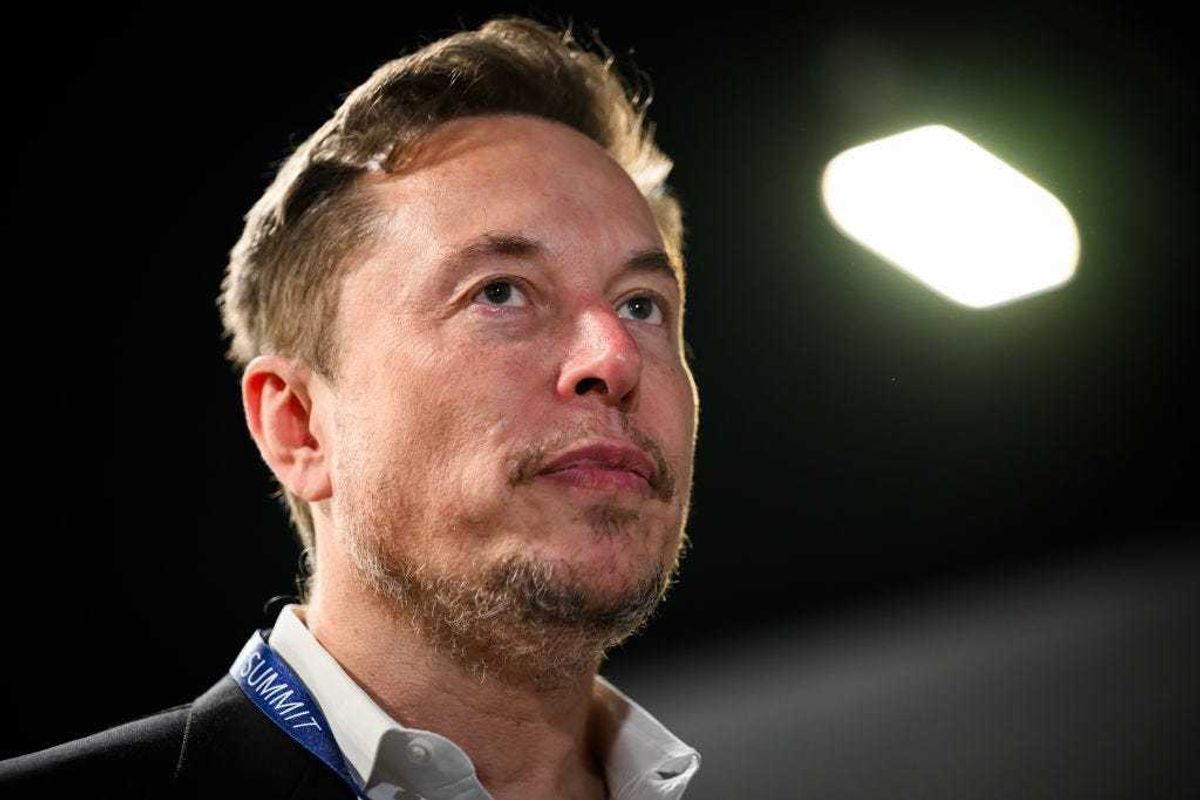 SpaceX, X (formerly known as Twitter), and Tesla CEO Elon Musk speaks with members of the media during day one of the AI Safety Summit at Bletchley Park on November 01, 2023 in Bletchley, England.