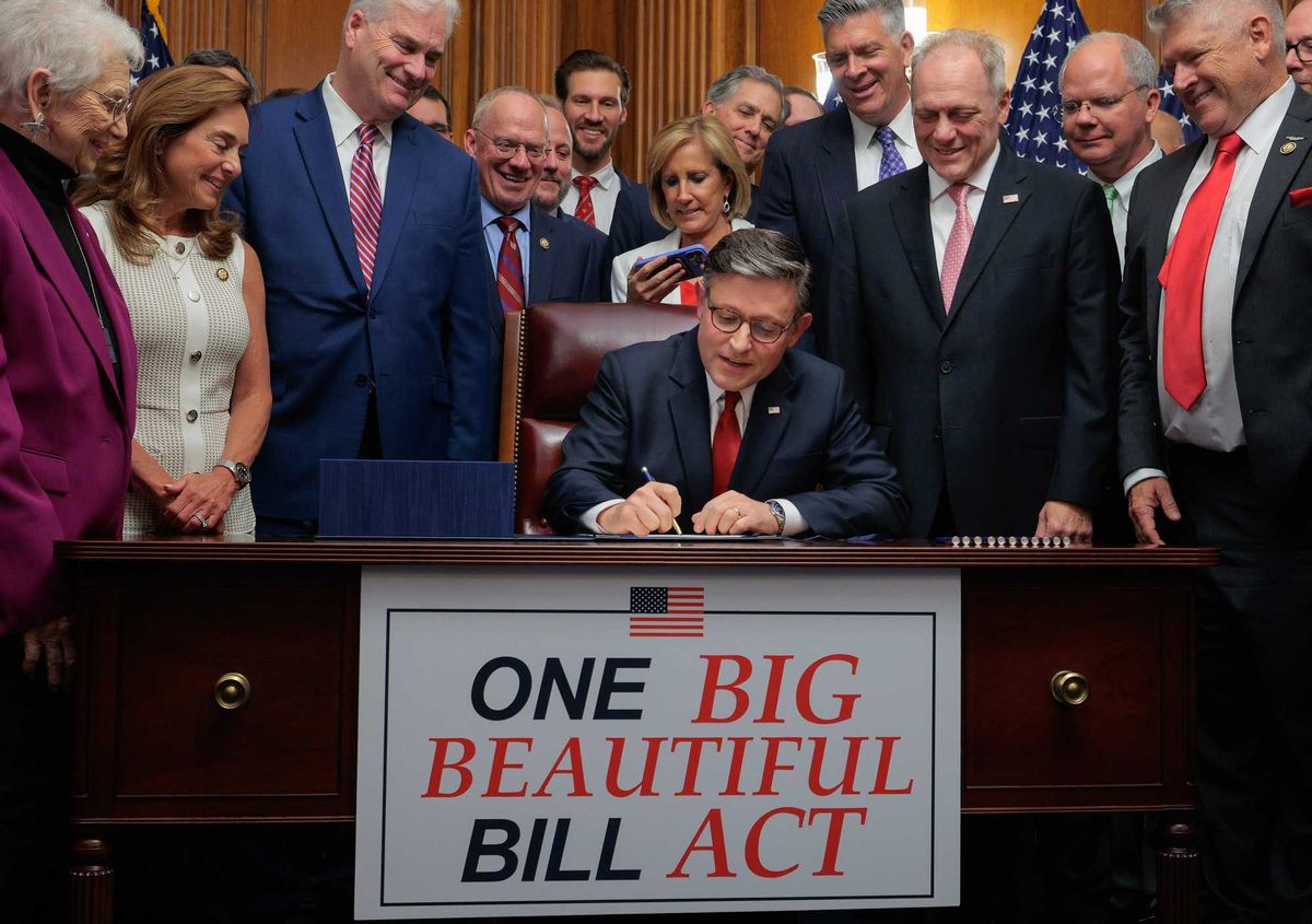 Speaker of the House Mike Johnson (R-LA) (C) signs the One Big Beautiful Bill Act during an enrollment ceremony with fellow Republicans including Minnesota Rep. Tom Emmer (standing, left) in the Rayburn Room at the U.S. Capitol on July 03, 2025 in Washington, DC.