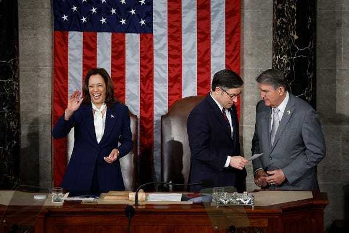 Speaker of the House Mike Johnson (R-LA) (C) talks with Sen. Joe Manchin (D-WV) as Vice President Kamala Harris stands by after Japanese Prime Minister Fumio Kishida addressed a joint meeting of Congress in the House of Representatives at the U.S. Capitol on April 11, 2024 in Washington, DC.