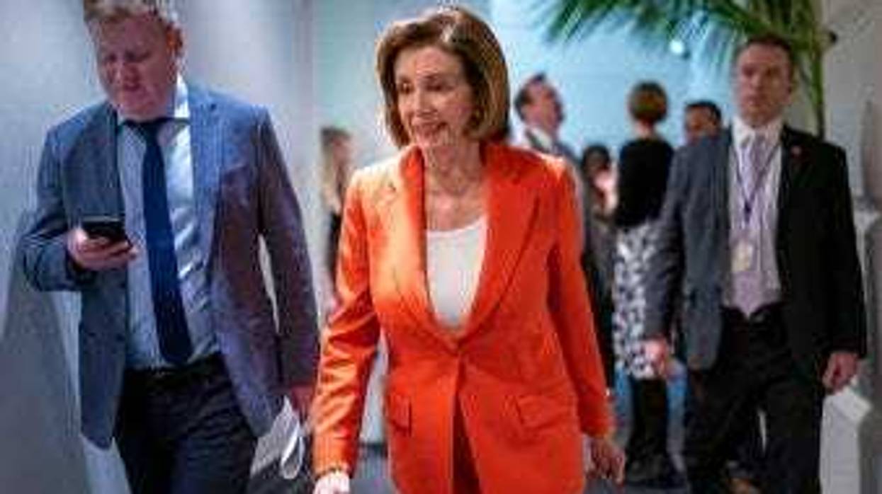 Speaker of the House Nancy Pelosi, D-Calif., arrives for a meeting with fellow Democrats on Capitol Hill in Washington, Wednesday, Feb. 26, 2020. (AP Photo/J. Scott Applewhite)