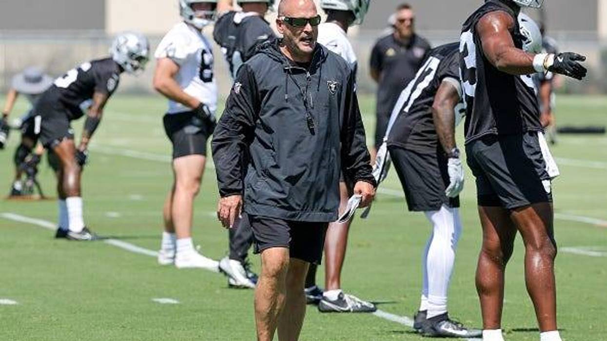 Special teams coordinator Tom McMahon of the Las Vegas Raiders walks on a field during mandatory minicamp at the Las Vegas Raiders Headquarters/Intermountain Healthcare Performance Center on June 10, 2025 in Henderson, Nevada.