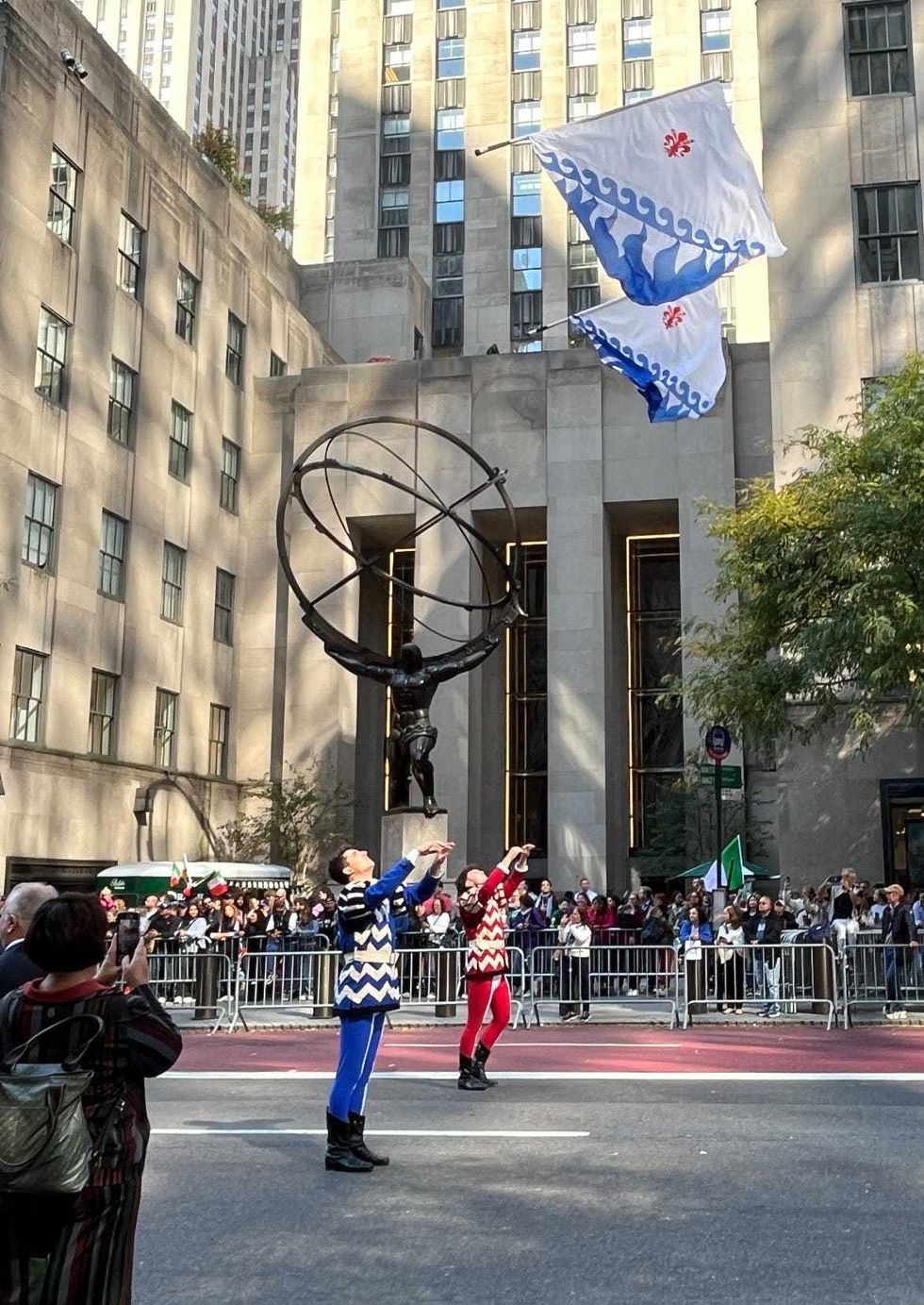 Spectators watch along Fifth Avenue