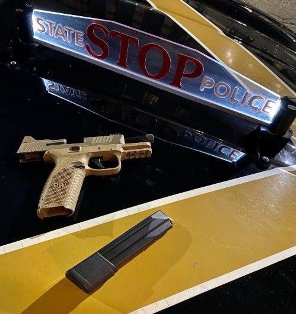 speeding driver found with loaded gun
