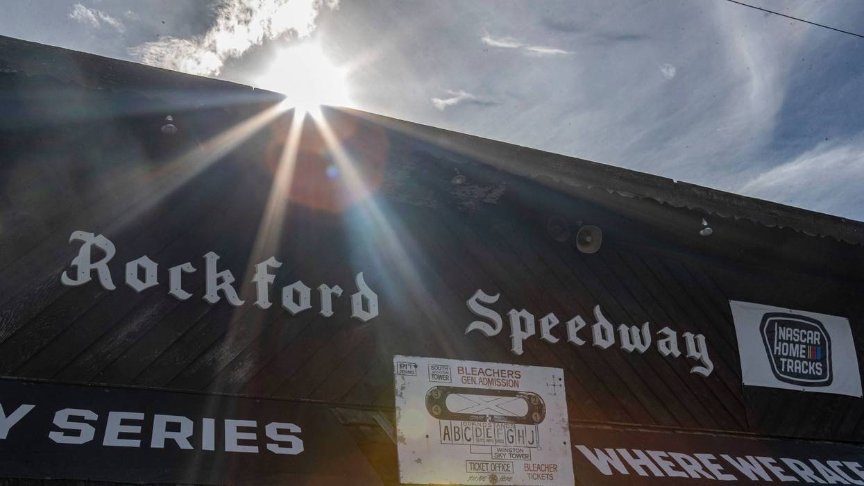 speedway entrance with sun over the roof