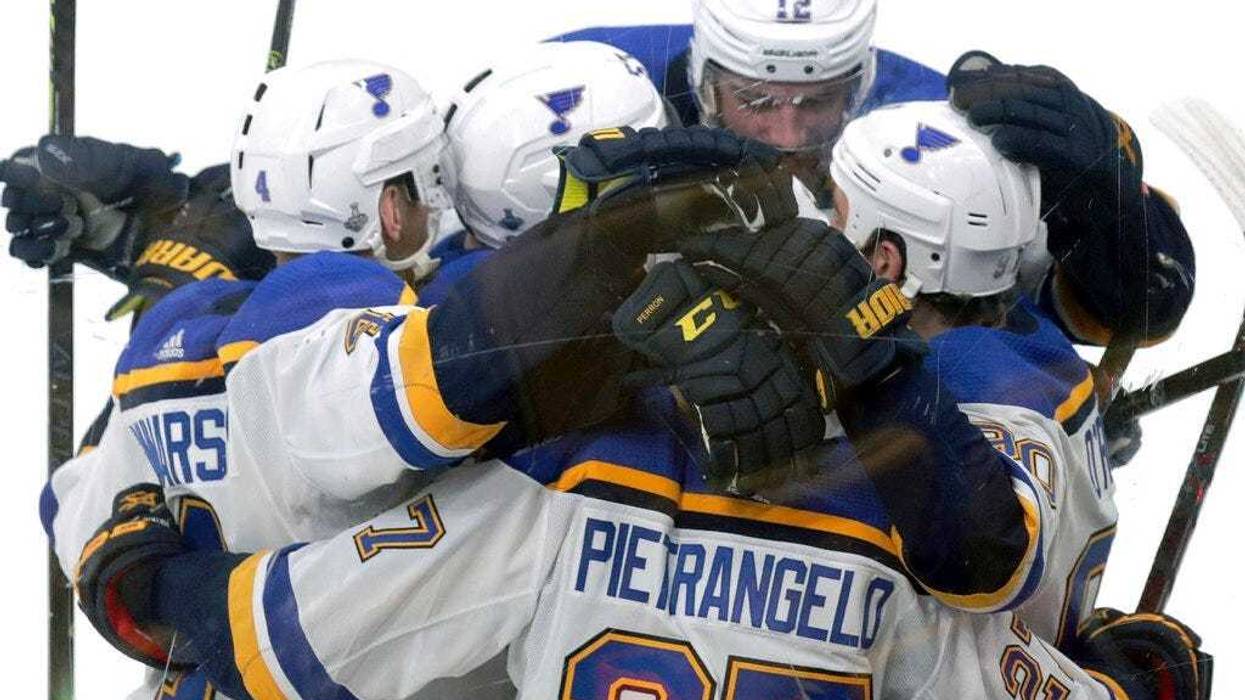 St. Louis Blues' Ryan O'Reilly, right, celebrates his goal against the Boston Bruins with teammates during the second period in Game 5 of the NHL hockey Stanley Cup Final, Thursday, June 6, 2019, in Boston.