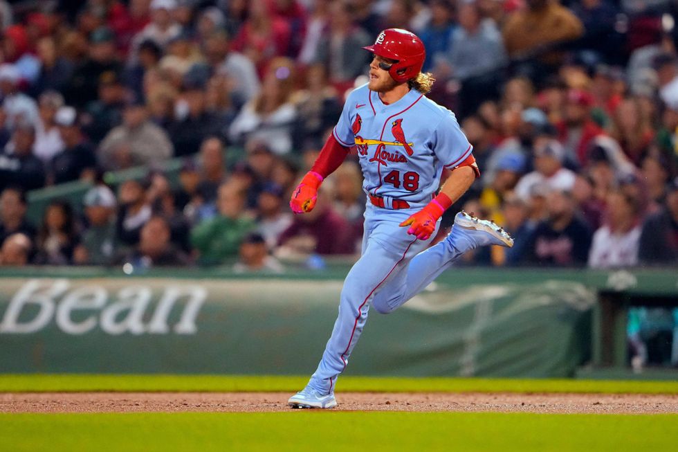 St. Louis Cardinals center fielder Harrison Bader (48) runs out a double against the Boston Red Sox during the fourth inning at Fenway Park.