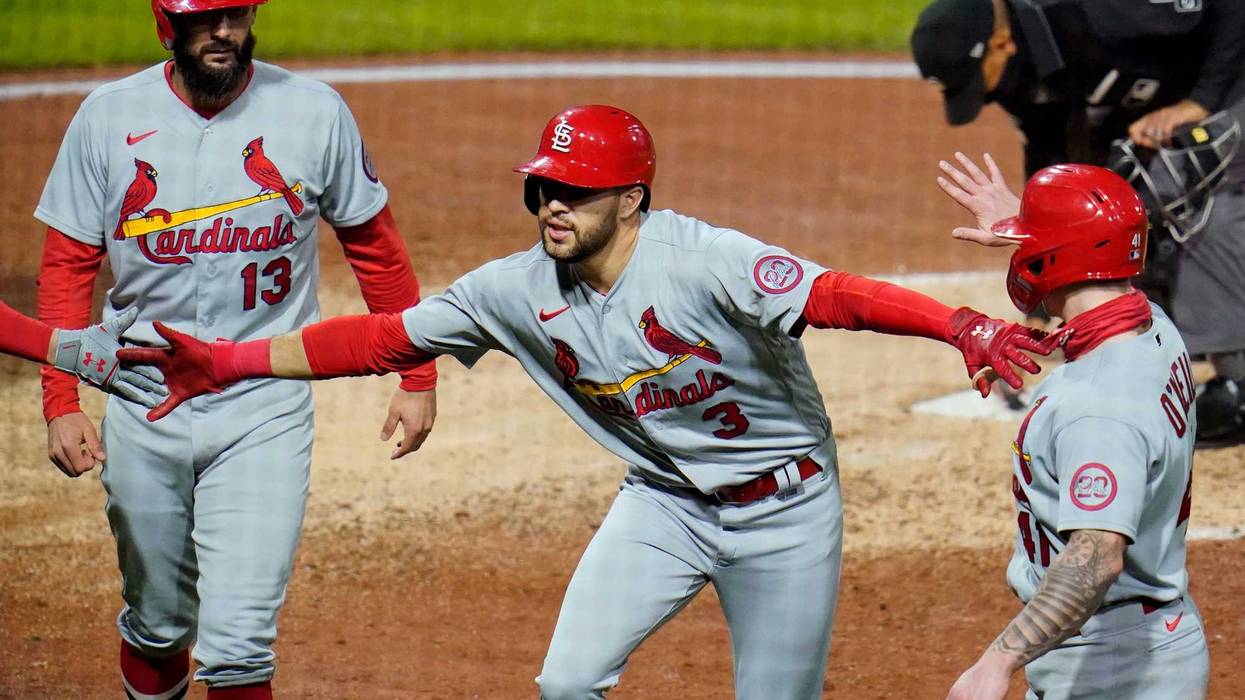 St. Louis Cardinals' Dylan Carlson celebrates as he heads to the dugout after hitting a three-run home run off Pittsburgh Pirates relief pitcher Chris Stratton during the sixth inning of the second baseball game of a doubleheader in Pittsburgh, Friday, Sept. 18, 2020.