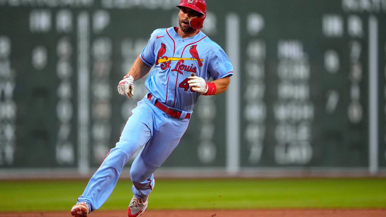 St. Louis Cardinals first baseman Paul Goldschmidt (46) rounds third base to score on a two run home run by third baseman Nolan Arenado (not pictured) against the Boston Red Sox during the first inning at Fenway Park.