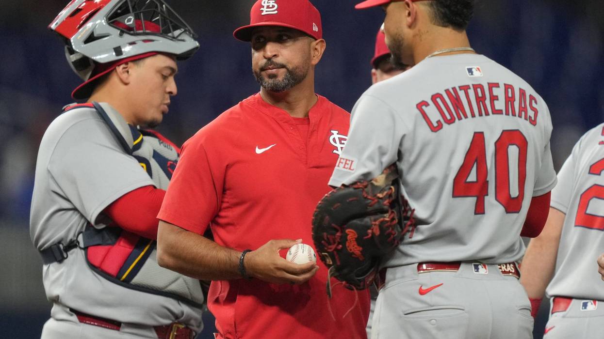 St. Louis Cardinals manager Oliver Marmol makes a pitching change in the seventh inning against the Miami Marlins at loanDepot Park.