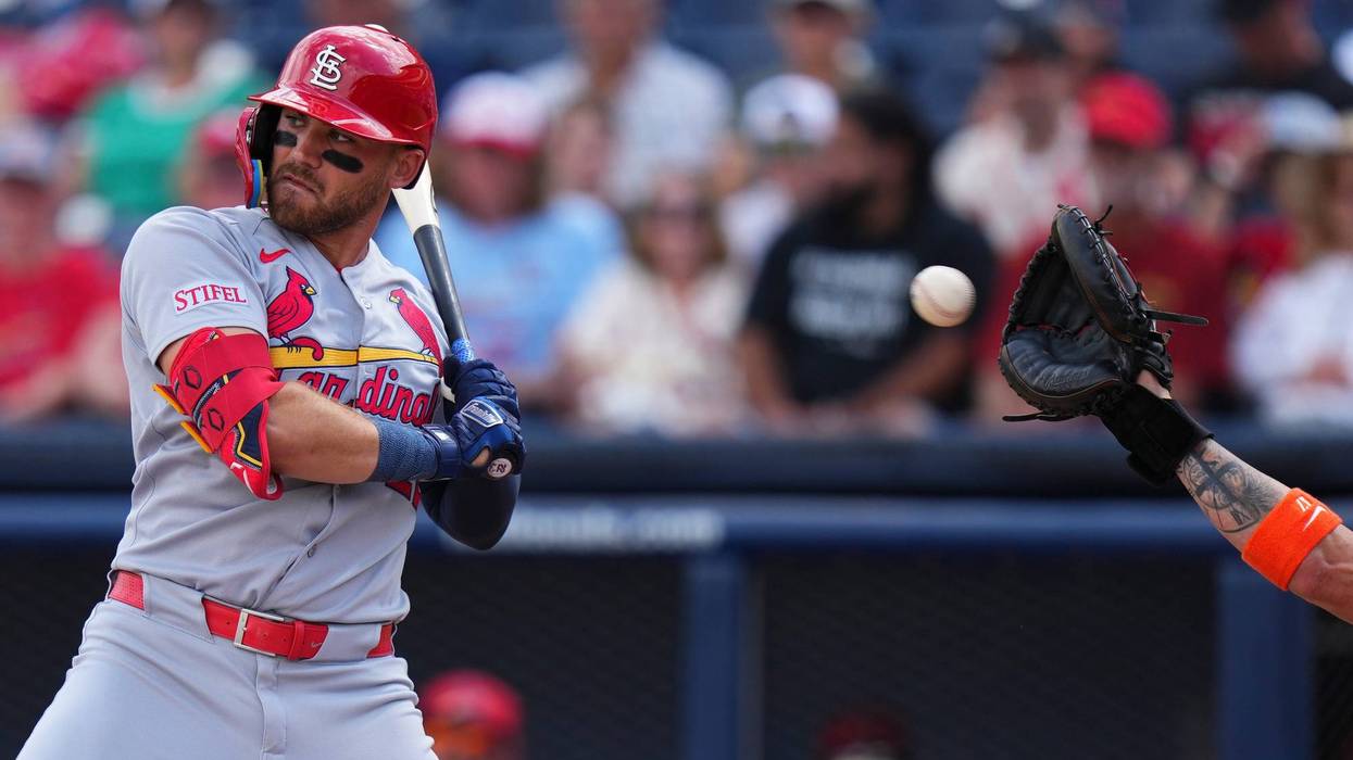 St. Louis Cardinals outfielder Michael Siani (22) ducks out of the way of a pitch against the Houston Astros during the first inning at CACTI Park of the Palm Beaches.