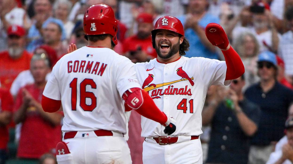 St. Louis Cardinals second baseman Nolan Gorman (16) is congratulated by right fielder Alec Burleson (41) after hitting a three run home run against the Toronto Blue Jays during the fourth inning at Busch Stadium.