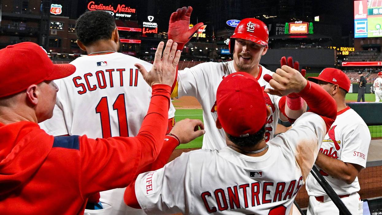 St. Louis Cardinals third baseman Nolan Gorman (16) celebrates with teammates after hitting a solo home run against the Athletics during the seventh inning at Busch Stadium.
