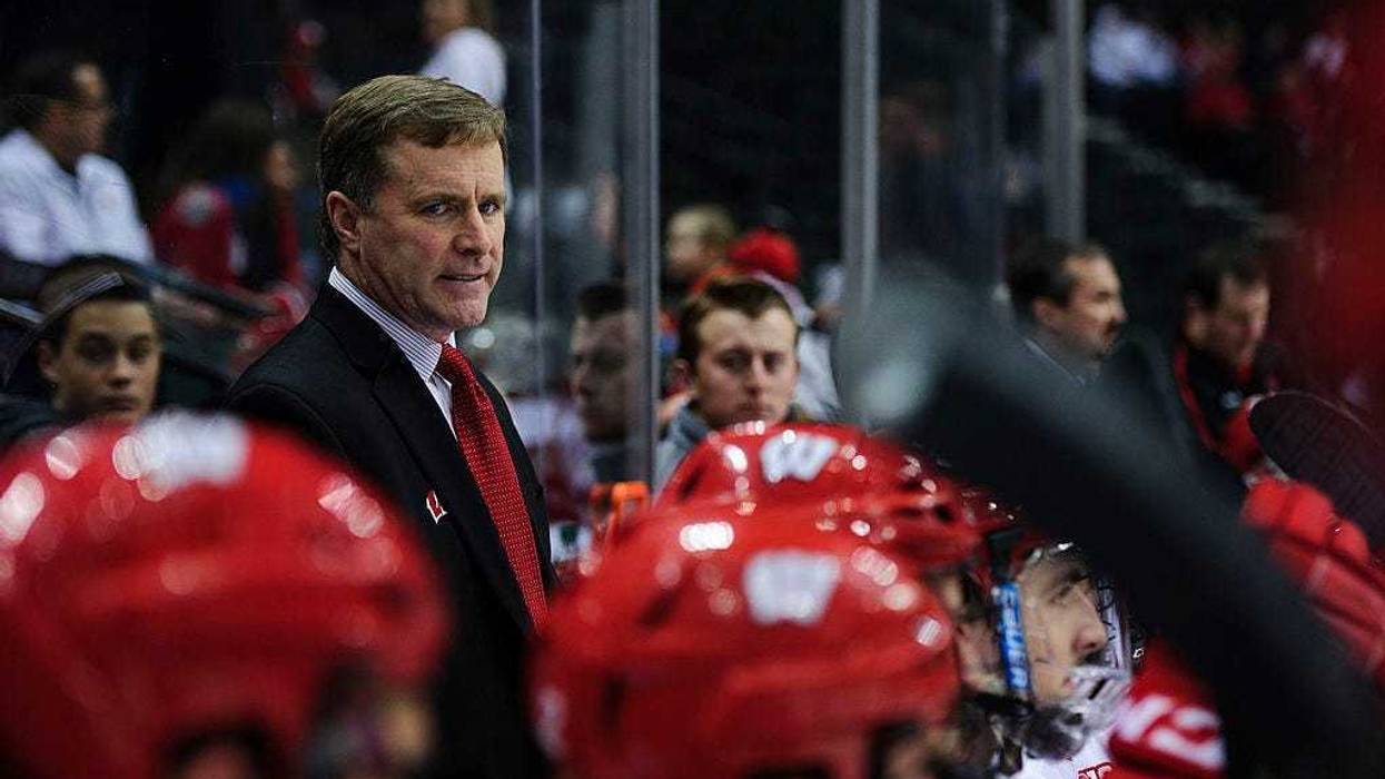 ST PAUL, MN - MARCH 21: Mike Eaves of the Wisconsin Badgers looks on during the semifinal game of the Big Ten Men's Ice Hockey Championship against the Penn State Nittany Lions on March 21, 2014 at Xcel Energy Center in St Paul, Minnesota. (Photo by Hanna