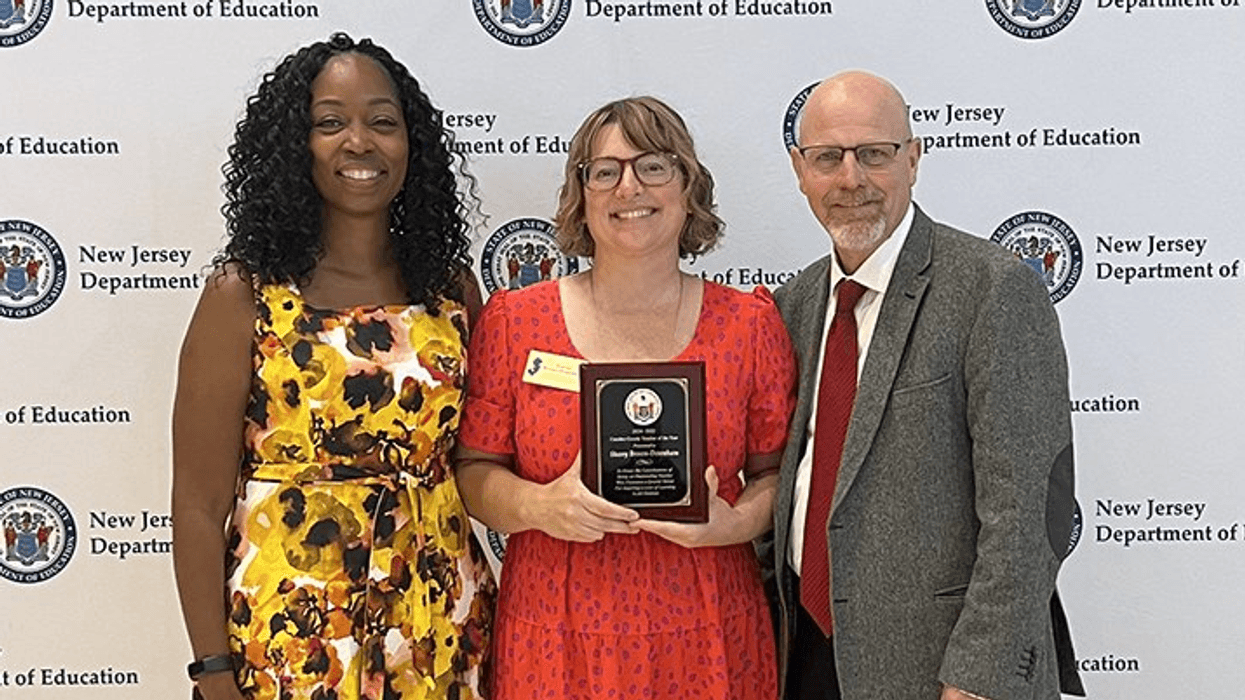 Stacey Brown-Downham (center), a reading interventionist and special education teacher at Tatem Elementary School in Haddonfield, was named Camden County's 2024–2025 Teacher of the Year.