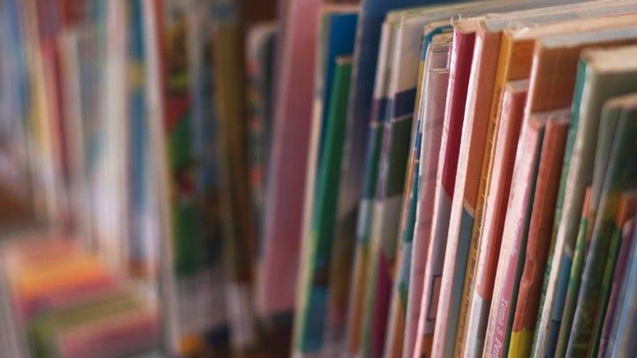 Stacked Books on a Home Bookshelf