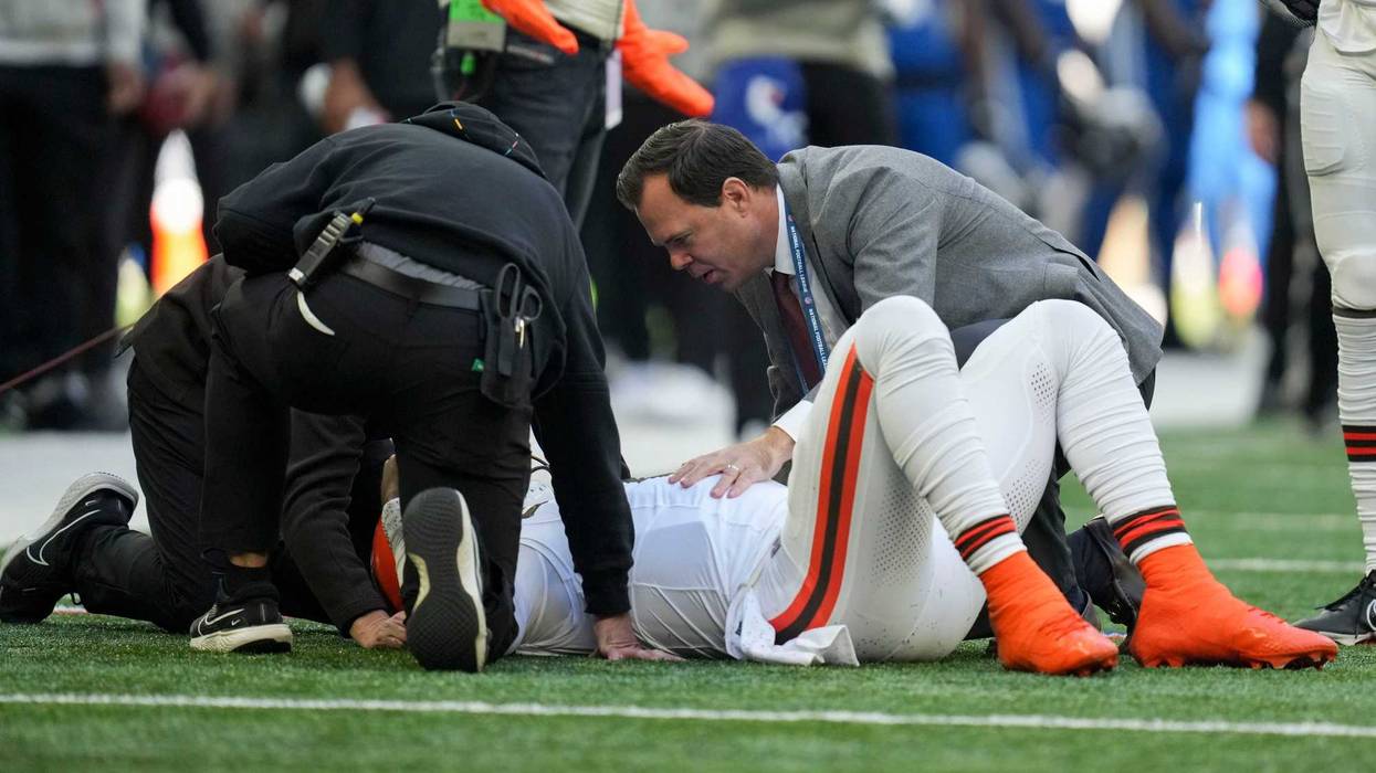 Staff attend to Cleveland Browns quarterback Deshaun Watson (4) on Sunday, Oct. 22, 2023, during a game against the Indianapolis Colts at Lucas Oil Stadium in Indianapolis.