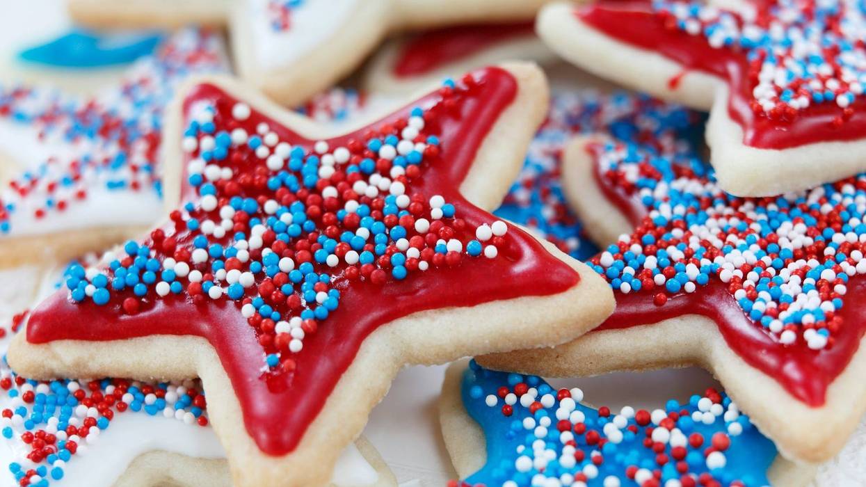 Star sugar cookies decorated for 4th of July Independence day celebration in America. Icing and sprinkles in red, white, and blue.