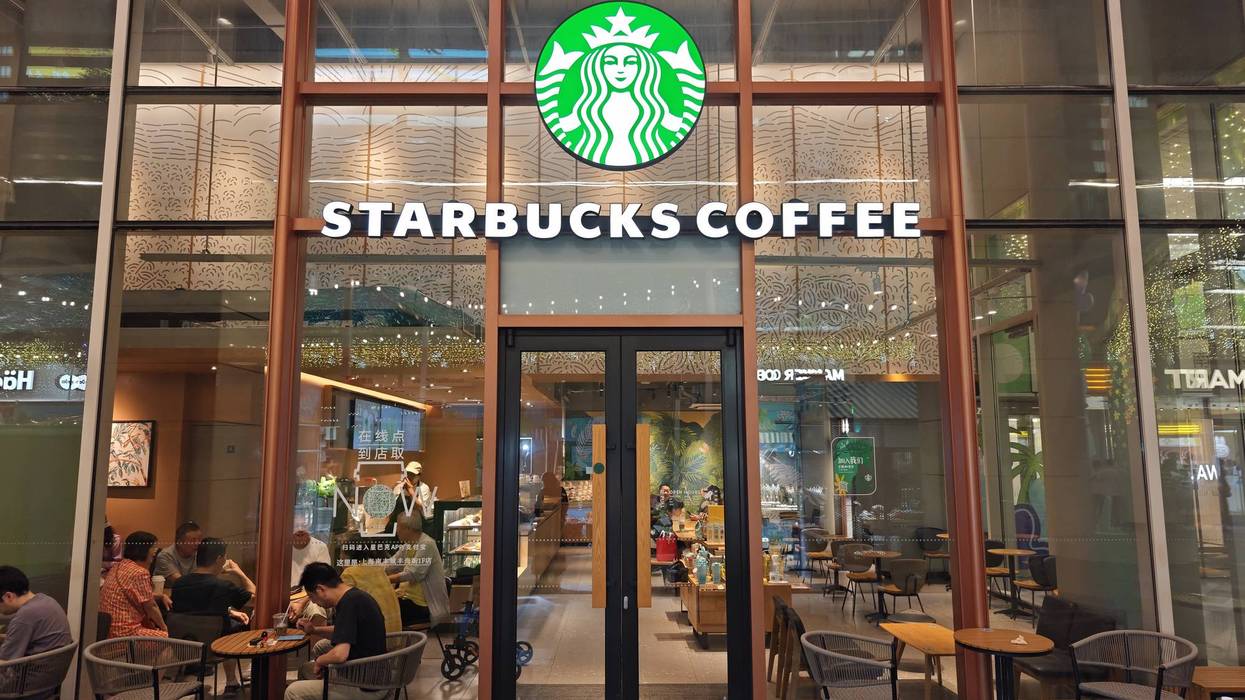 Starbucks coffee store facade with people