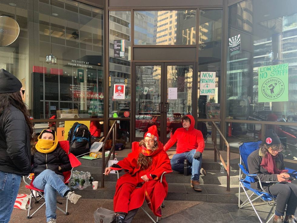 Starbucks union members during the Red Cup Strike on Thursday at a Center City location.