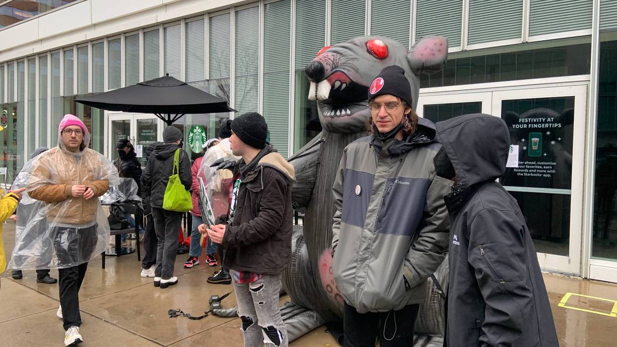 Starbucks workers protesting outside a location in University City on Friday.