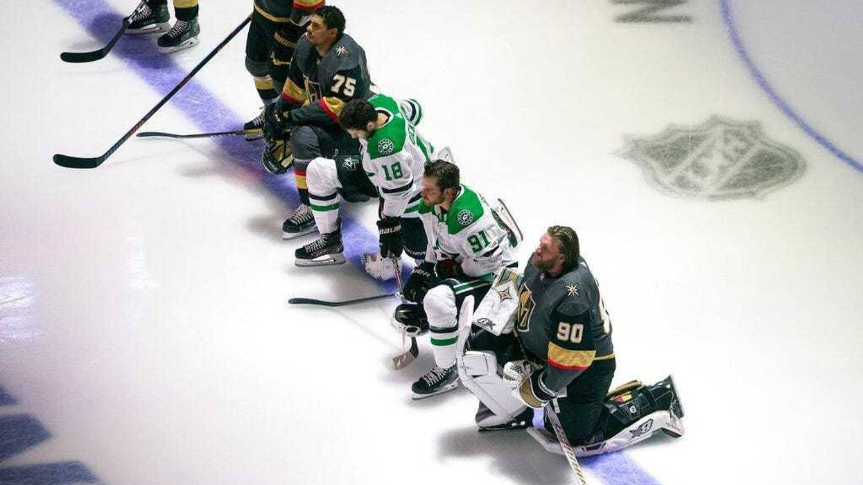 Stars, Knights players kneel
