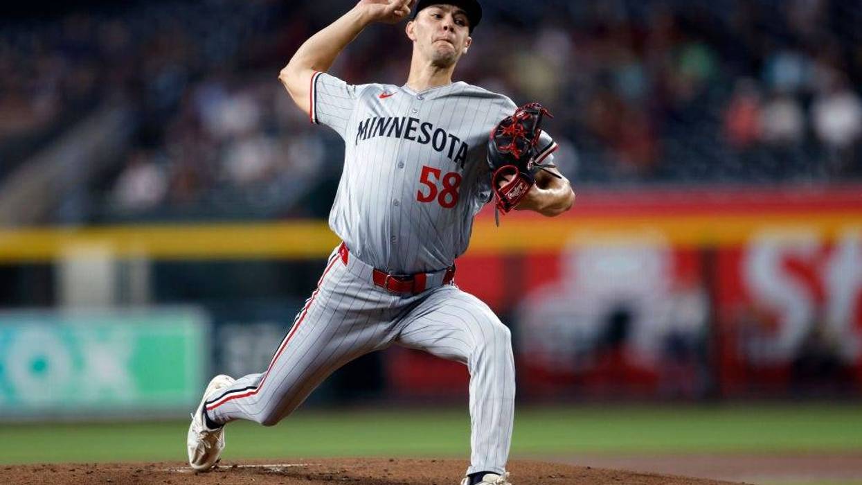 Starter David Festa #58 of the Minnesota Twins pitches during the first inning of his MLB debut against the Arizona Diamondbacks at Chase Field on June 27, 2024 in Phoenix, Arizona.