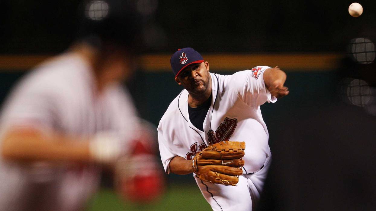 Starting pitcher C.C. Sabathia #52 of the Cleveland Indians deals against the Boston Red Sox during Game Five of the American League Championship Series at Jacobs Field on October 18, 2007 in Cleveland, Ohio.