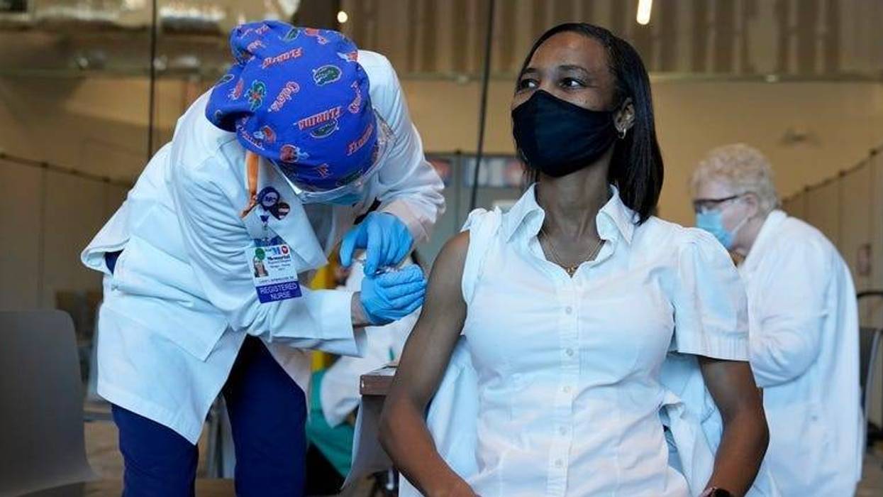 State health workers receive first doses of COVID-19 vaccines