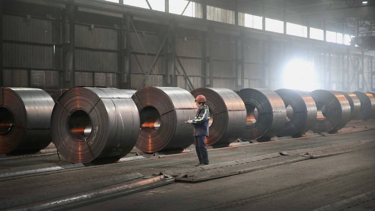 Steel coils produced at the NLMK Indiana steel mill are prepared for shipping on March 15, 2018 in Portage, Indiana.