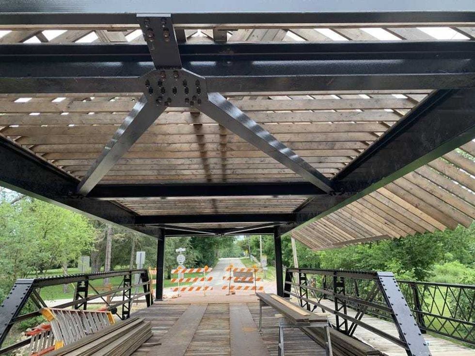 Steel frame reinforcing bridge