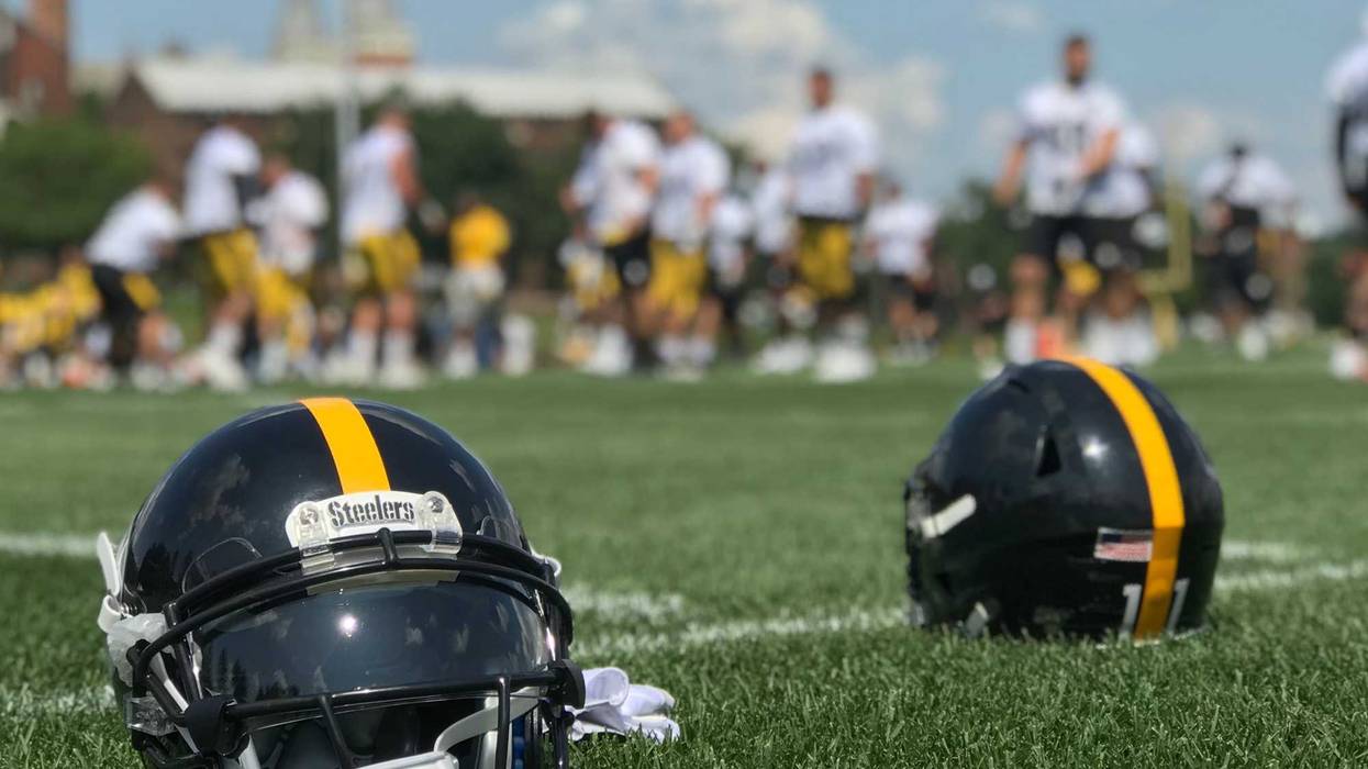 Steelers helmets on the field at Saint Vincent College in 2019 training camp