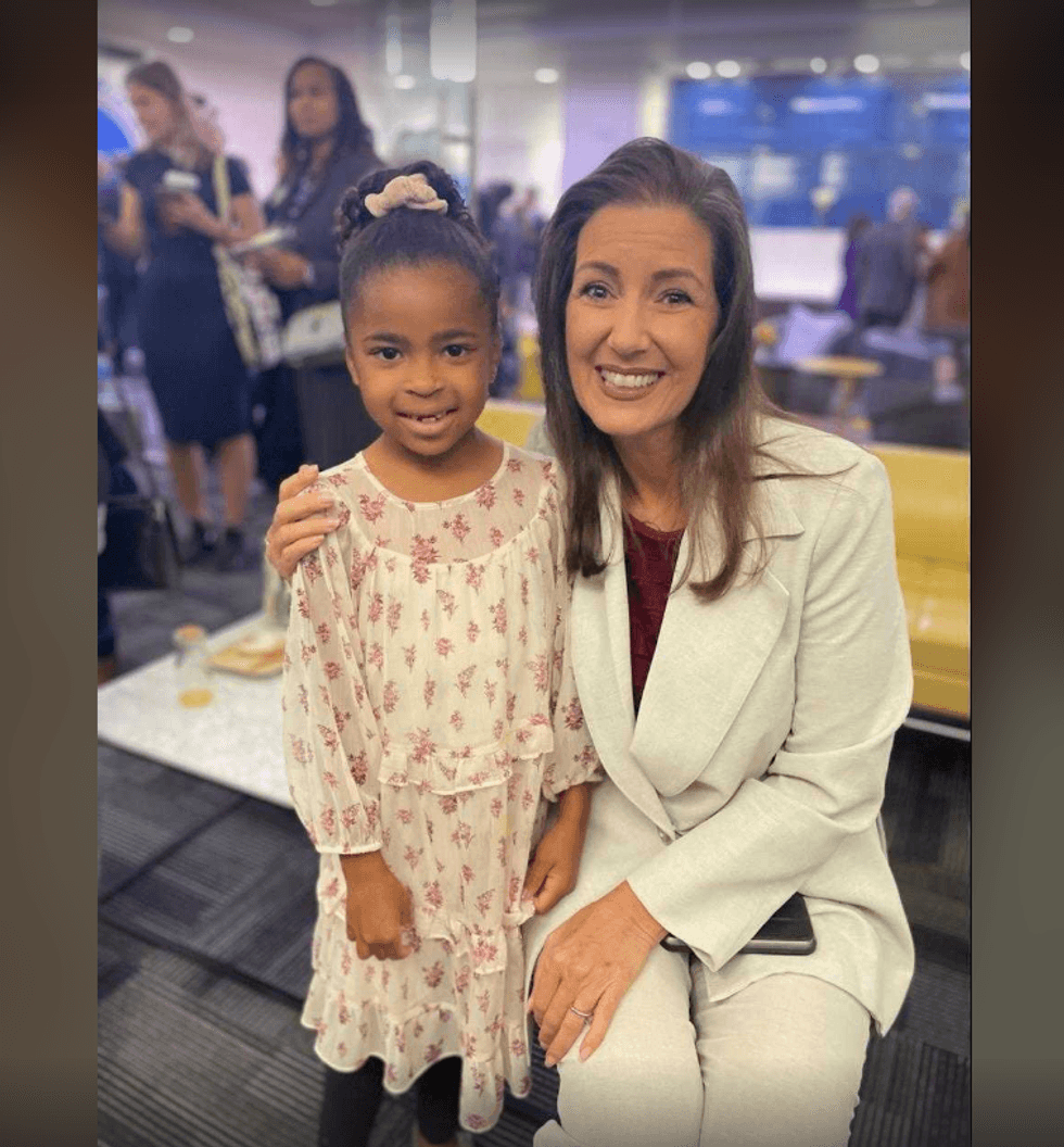 Stella Harrison, 7, with Oakland Mayor Libby Schaaf.