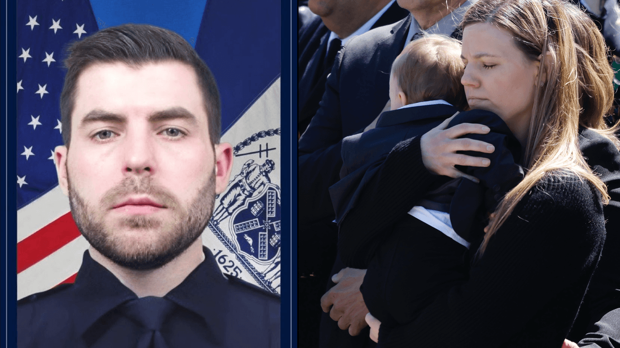 Stephanie Diller (right), the widow of NYPD Det. Jonathan Diller (left), carries her son Ryan at the funeral of her husband at St. Rose of Lima R.C. Church on March 30, 2024 in Massapequa, New York