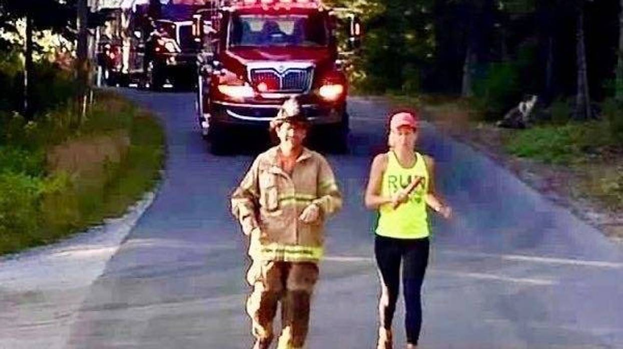 Steve Bender and Lisa Steiner running the first stage of the Run 2 Respond Relay with an escort from Great Cranberry Island Fire Department in Maine.