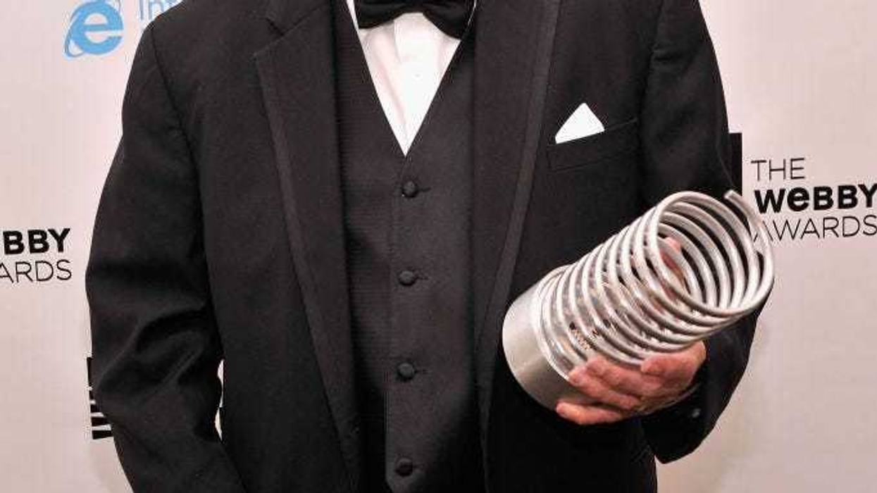 Steve Wilhite, inventor of the GIF file, poses with an award backstage at the 17th Annual Webby Awards at Cipriani Wall Street on May 21, 2013 in New York City. (Photo by Stephen Lovekin/Getty Images for The Webby Awards)