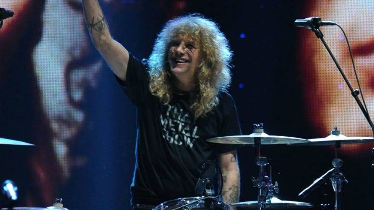 Steven Adler of Guns N' Roses performs on stage during the 27th Annual Rock And Roll Hall Of Fame Induction Ceremony