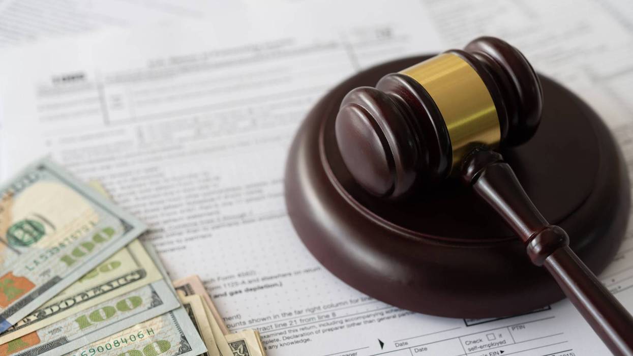 Stock image of gavel, money and tax forms