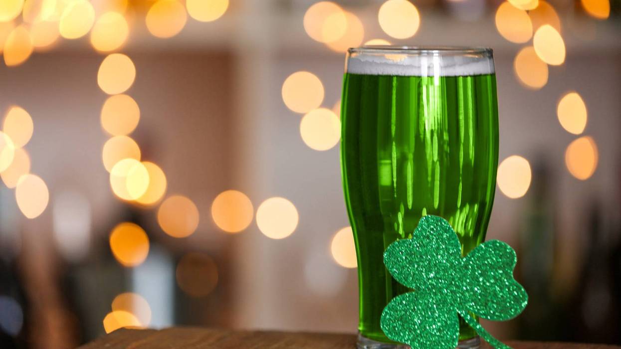 Stock image of green beer and shamrock