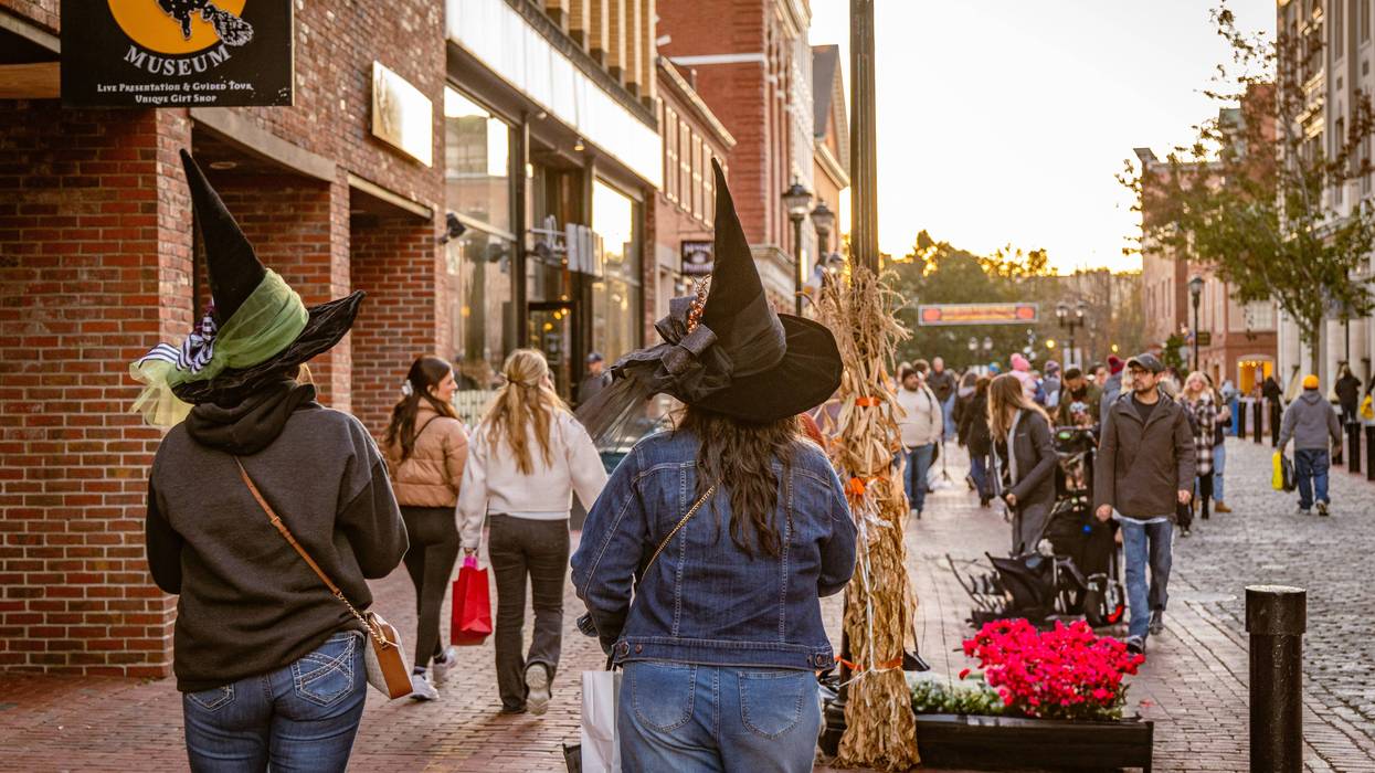 Stock image of people wearing witch hats