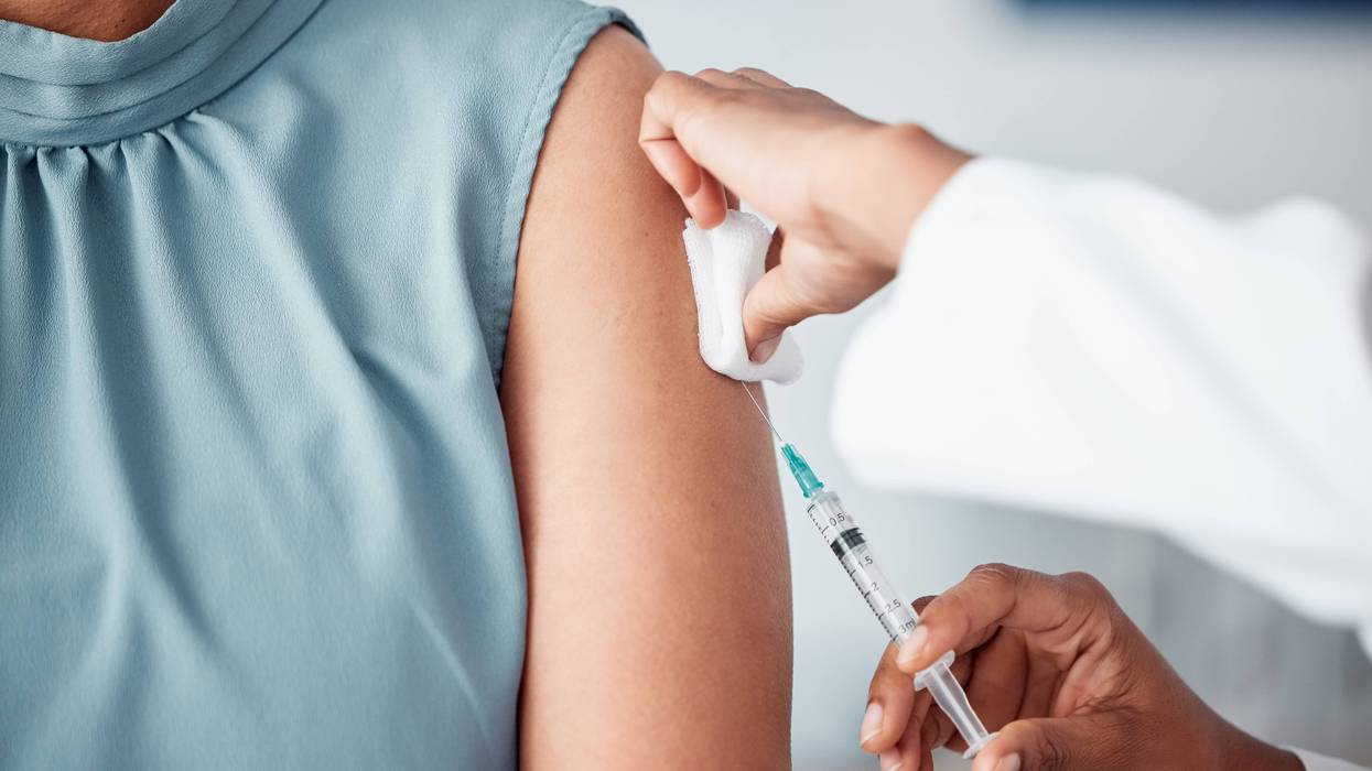 Stock image of someone getting a vaccine