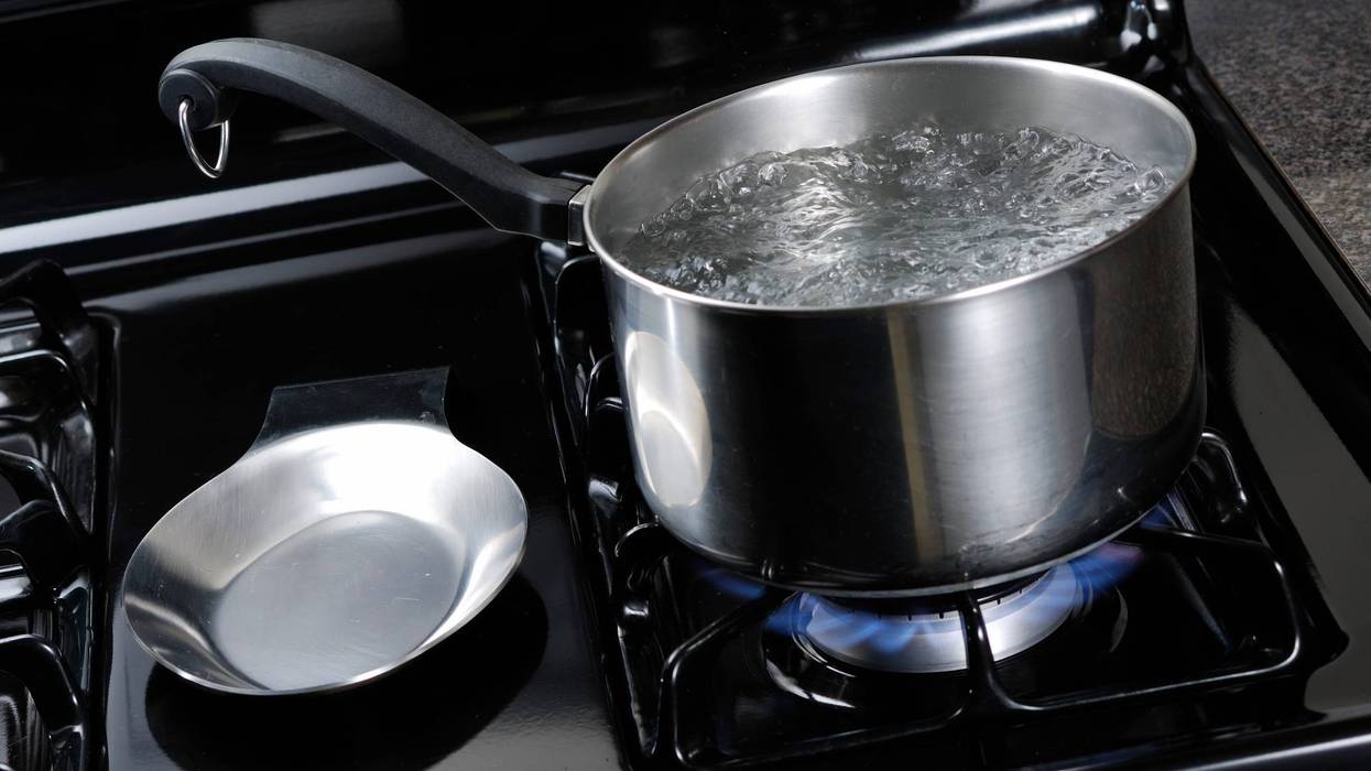 Stock image of water boiling on the stove