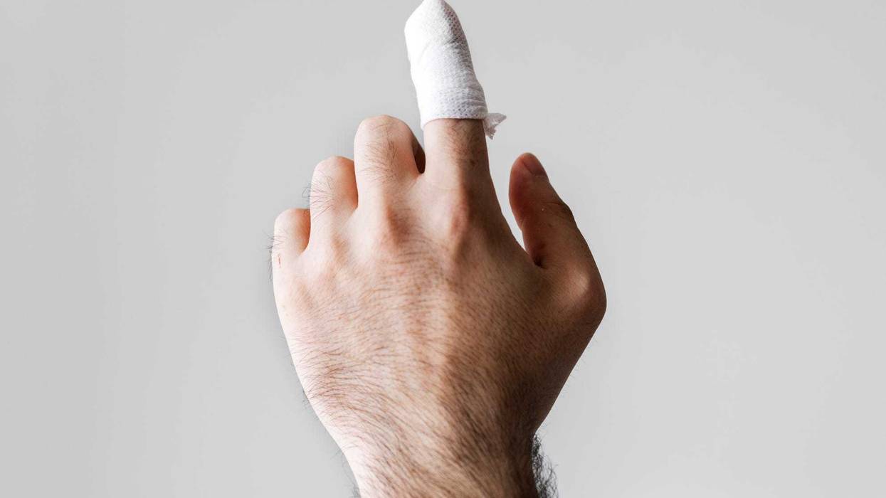 Stock photo. Hand with bandaged finger.