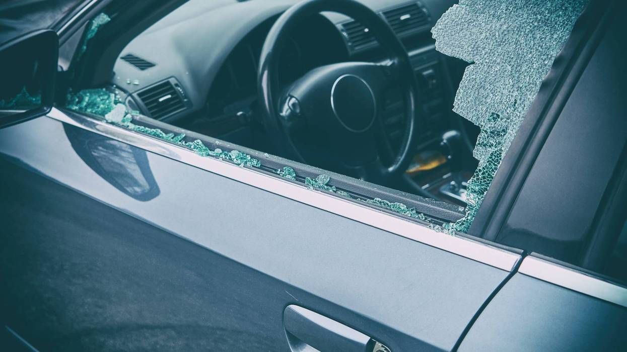 Stock photo of broken car window