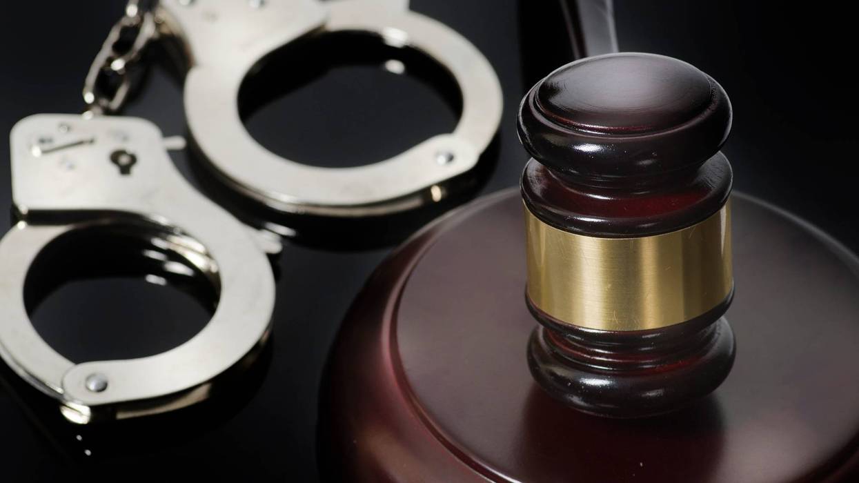 Stock photo of handcuffs and gavel