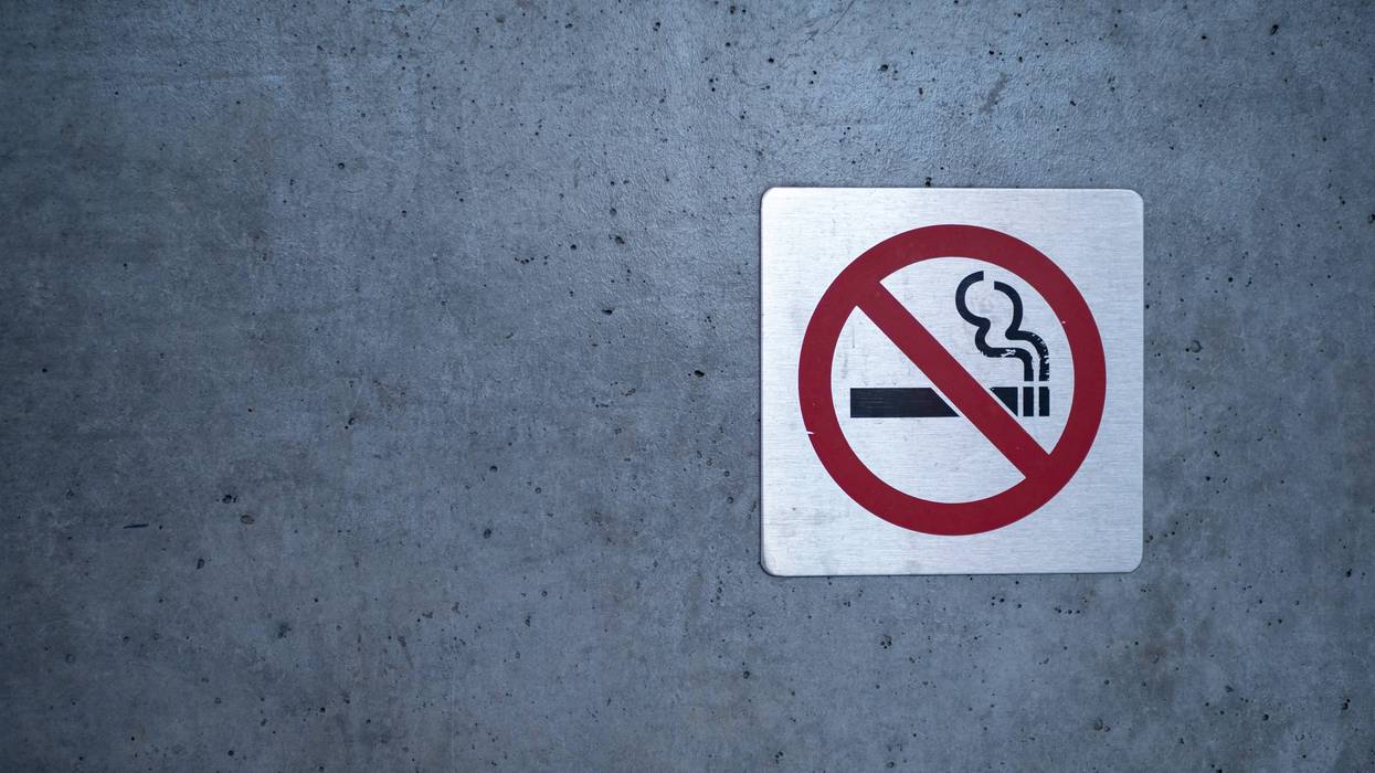 stock photo of no smoking sign (drawing of cigarette in a circle w/ a slash through it)