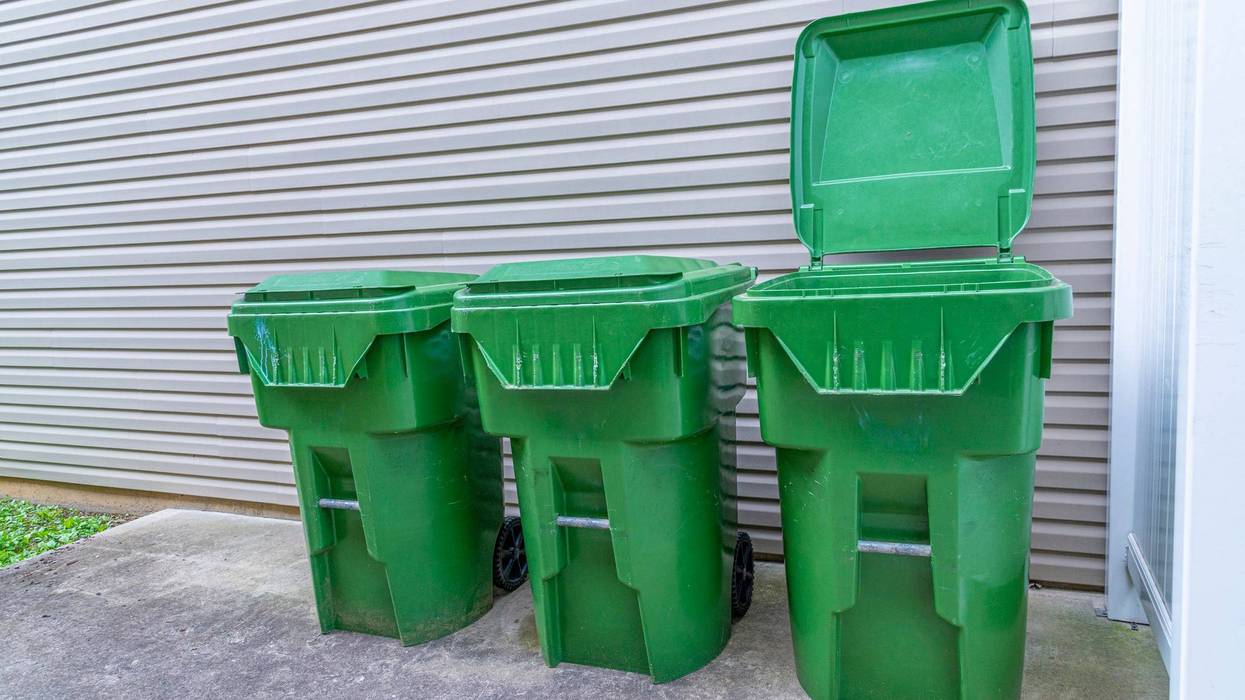 Stock photo of trash cans outside