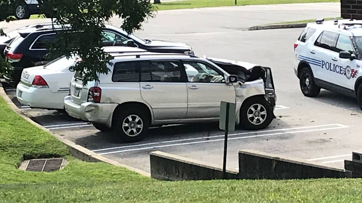 Stolen SUV slams into bus