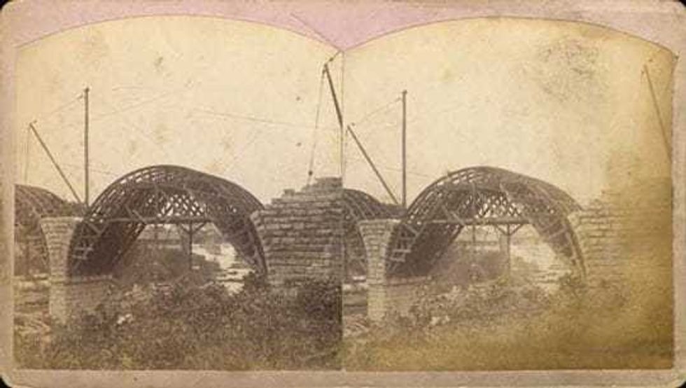 Stone Arch Bridge under construction in 1883.
