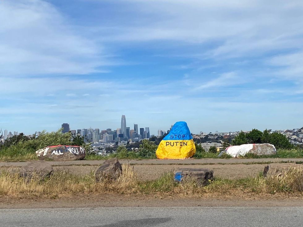 "Stop Putin" with the San Francisco skyline in the background.