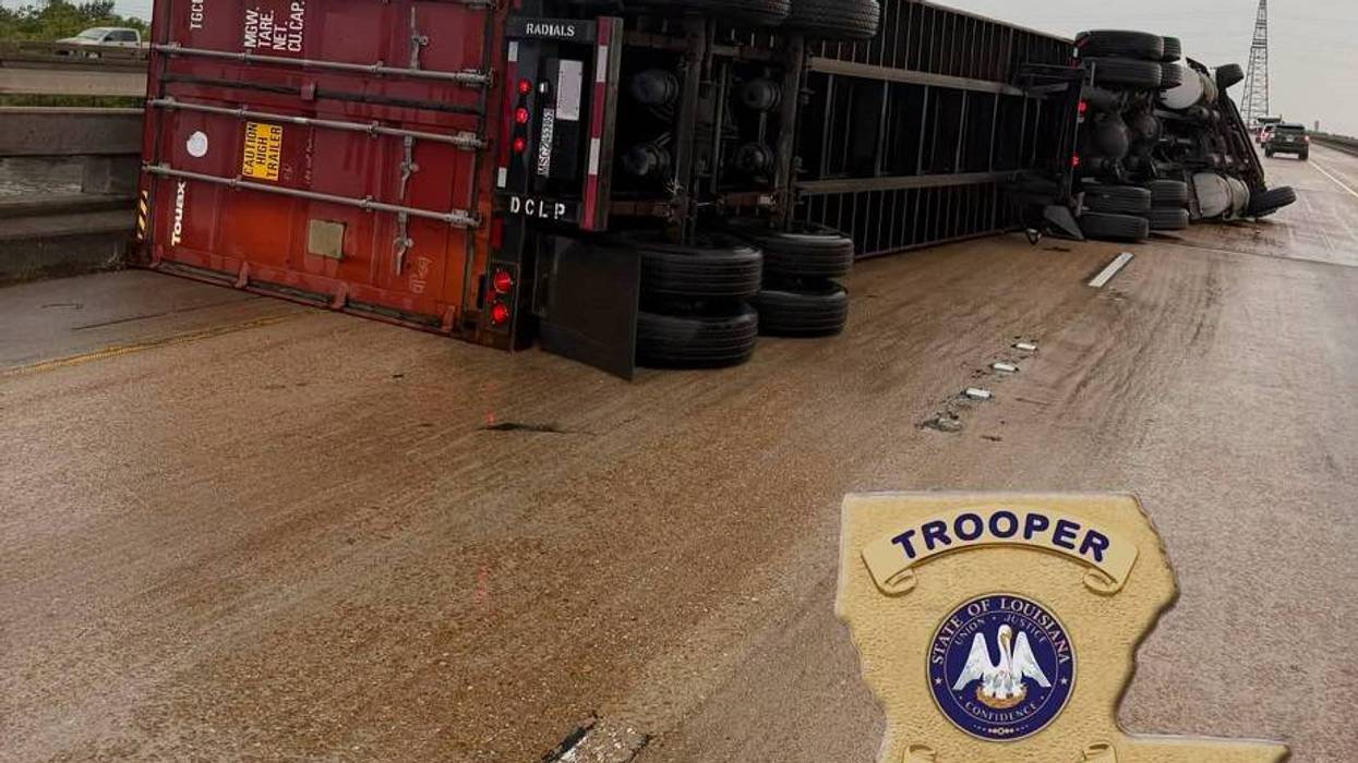 Storms knock over 18-wheeler on Spillway bridge